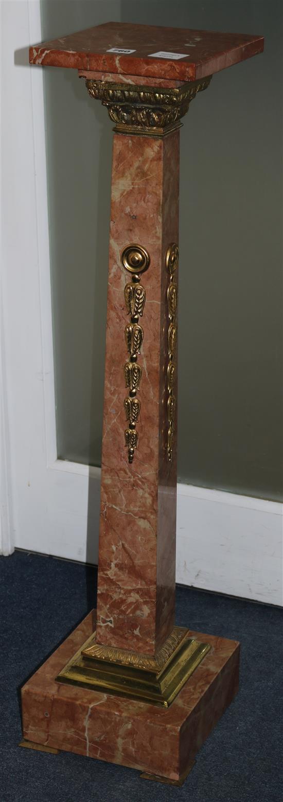 A rouge marble pedestal H.98cm